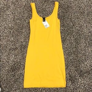 Yellow body con dress from H&M Brand New!